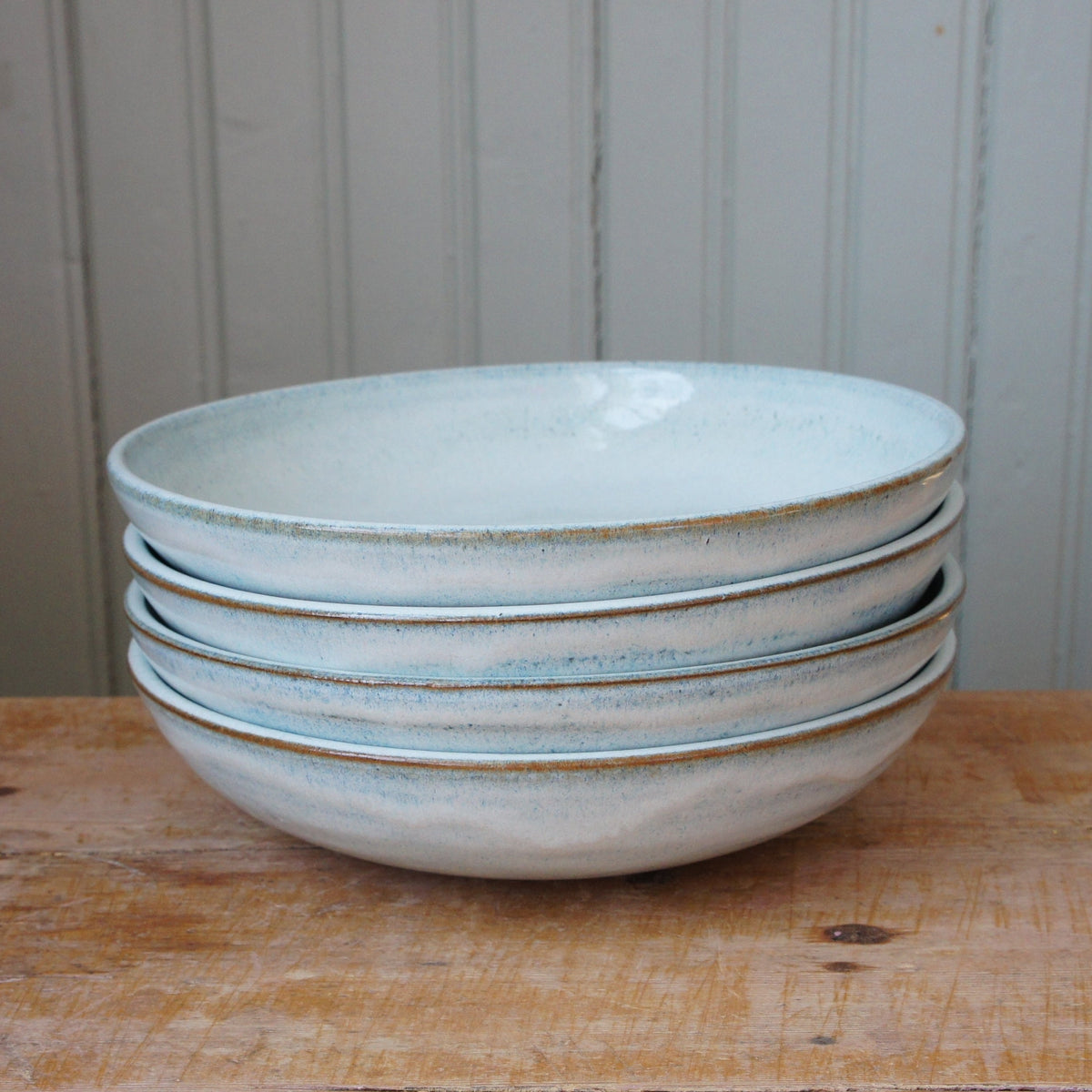 Deep plate with ice blue glaze