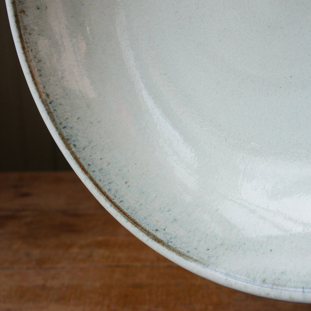 Deep plate with ice blue glaze