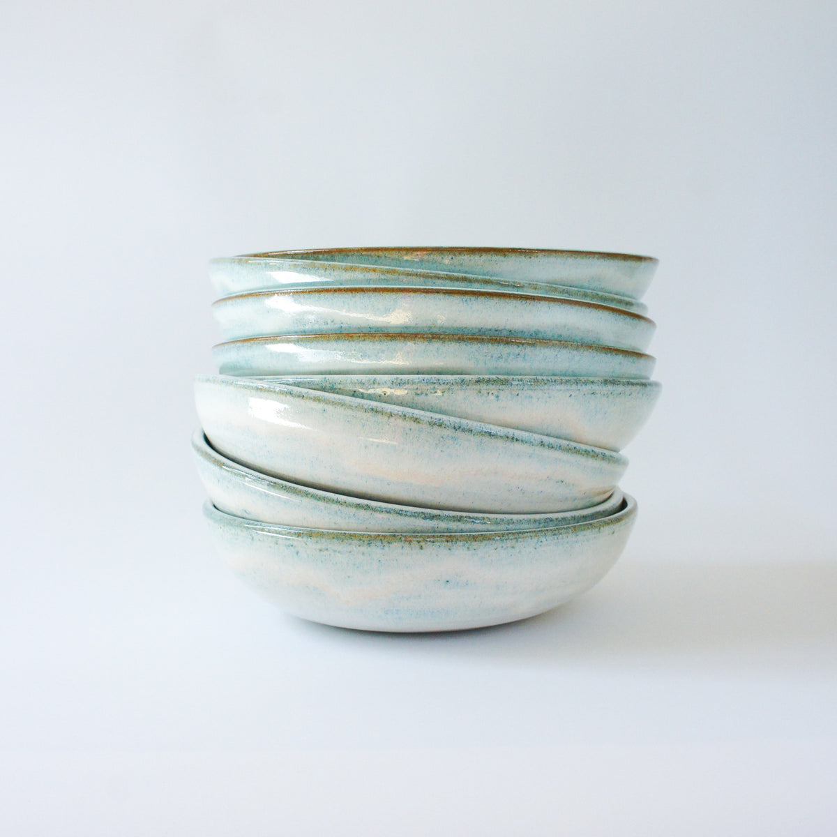 Deep plate with ice blue glaze